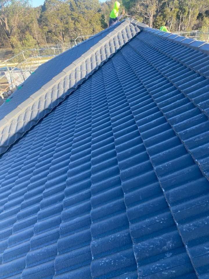 The finished ridge line, looking back down the roof.